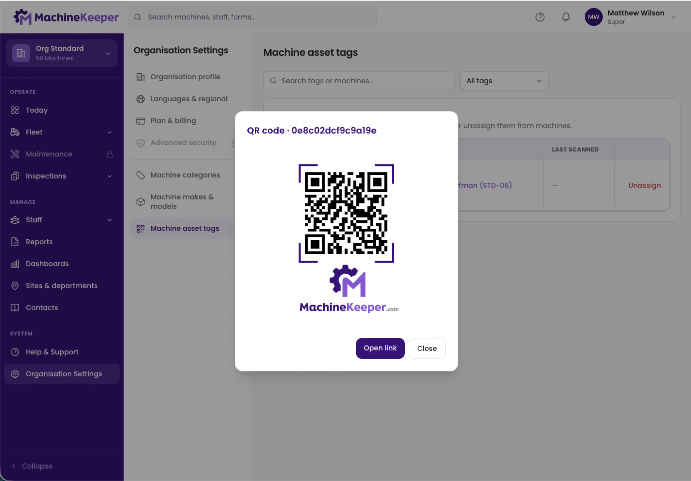 Machine asset tag QR code on desktop